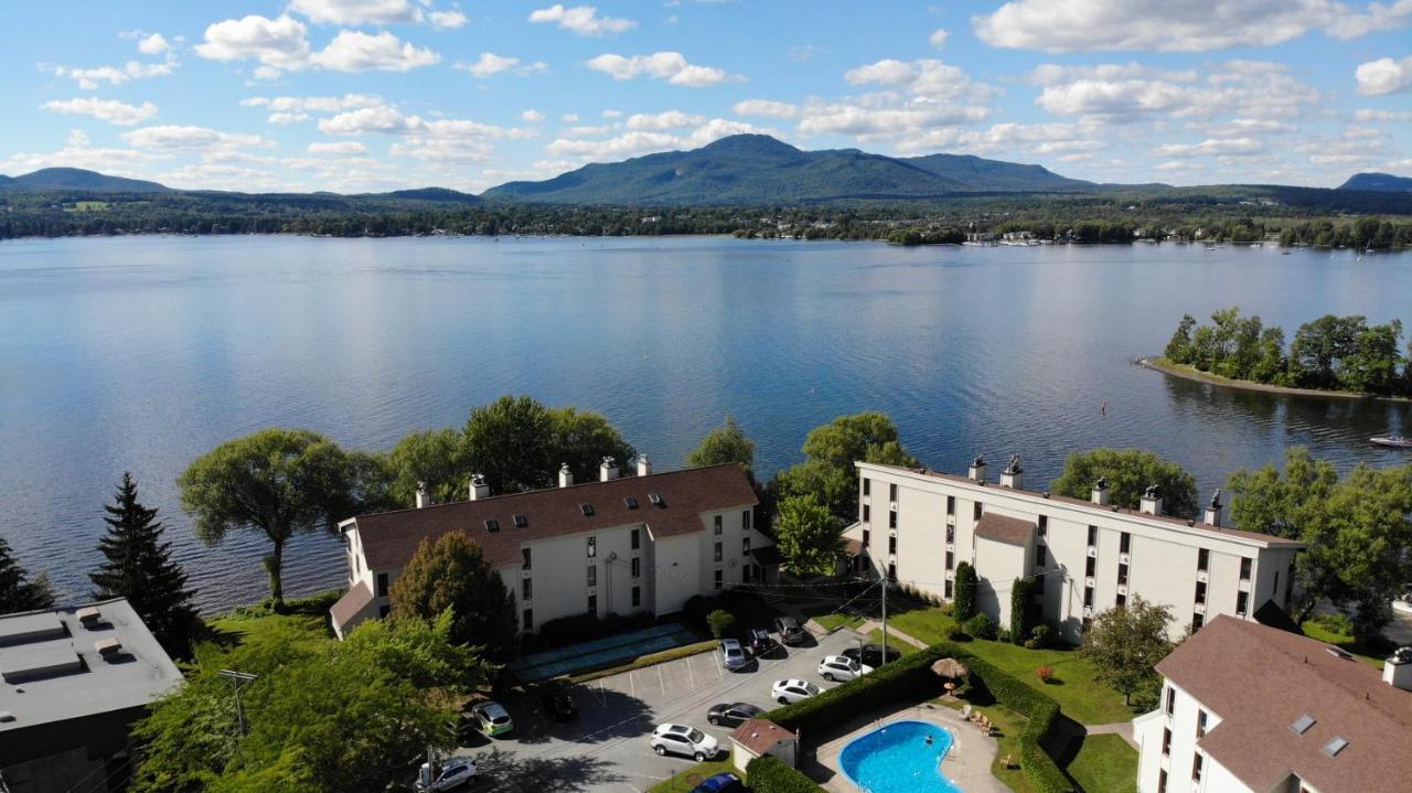 Location Tourisme Estrie - Oberge Du Village Magog Esterno foto